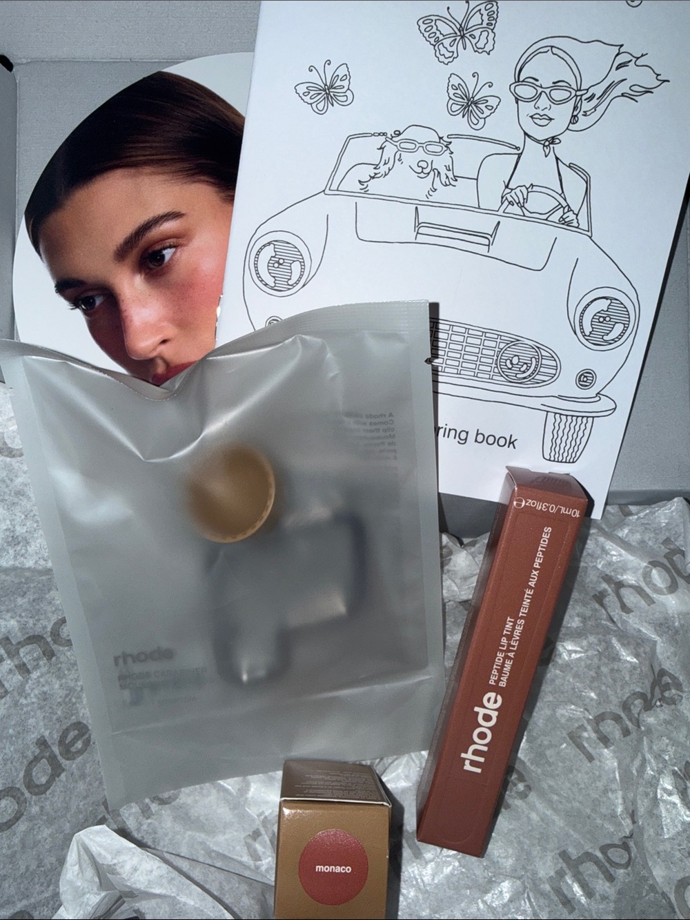 RHODE peptide lip tint, carabiner, and blush